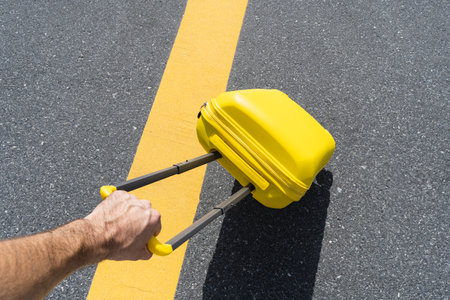 Traveler suitcase at the airport before departure. Travel, vacation, tourism, flights concept. Selected focusの写真素材