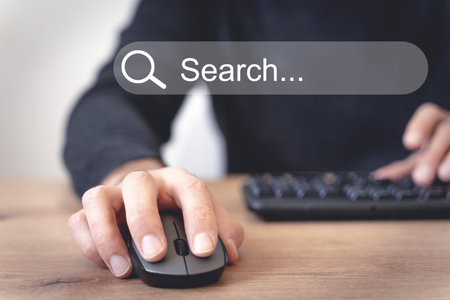 Internet search concept. User uses a computer with the Internet.