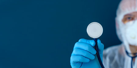 Medic with stethoscope in the hospital. Medical banner background.の写真素材