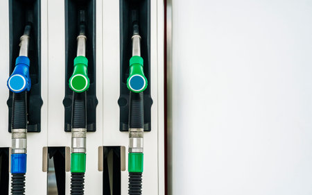 Gas station. Pistols with gasoline and diesel fuel at a car gas station. Oil business and...