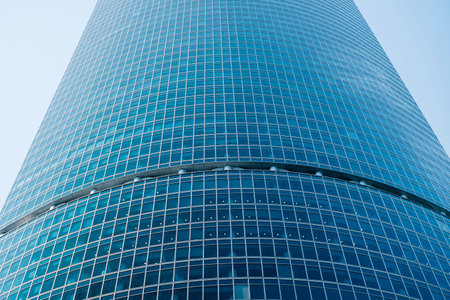 Business building with glass windows and offices background. Finance, luxury, economy, development,...