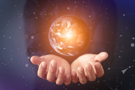 Planet Earth in hands. Global, world, business, technology concept.
