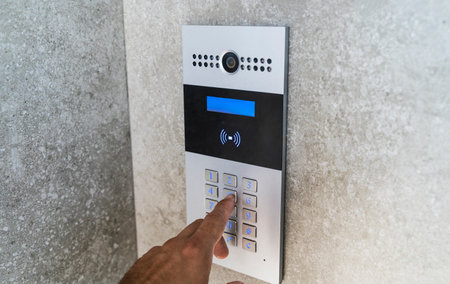 Intercom on door house. Electronic key and video call for entry.の写真素材