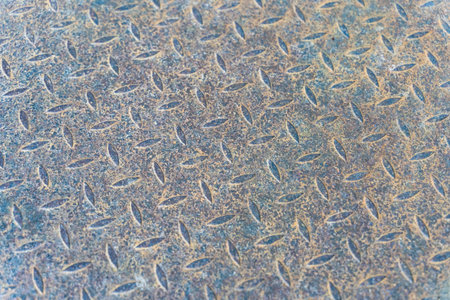 Rust metal diamond surface background.