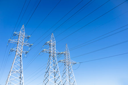 High voltage tower against the sky. Power transmission tower with wiresの写真素材