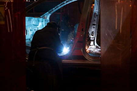 Industrial production of car automobiles. Plant for assembling modern cars on an assembly line. Industry, production, industry concept.の写真素材