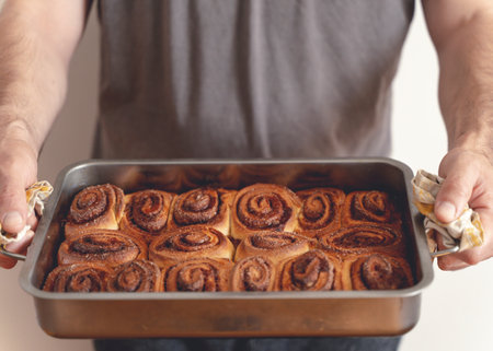 Cinnamon bun roll in plate. Homemade Oven bakery dessert for breakfastの写真素材