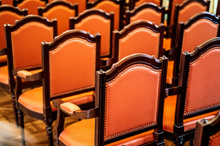 Classic chairs in the theater. Vintage velvet chairs in the theater performance hall.の写真素材