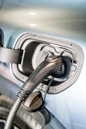 Charging an electric car. Modern electric car