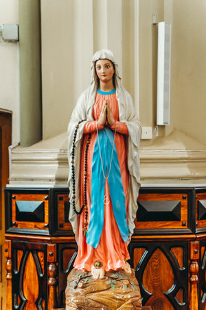 Virgin Mary statue in Christian Catholic church. Religion, Christianity, Catholicism conceptの写真素材