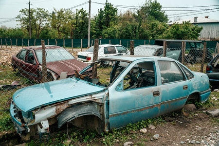 Abandoned broken down car on the street. Car dump and abandoned junk