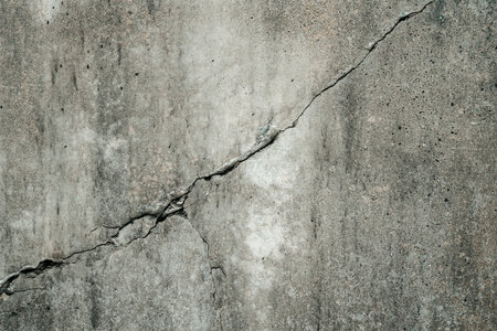 Concrete crack texture background texture. Grey crack wallの写真素材