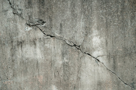 Concrete crack texture background texture. Grey crack wallの写真素材