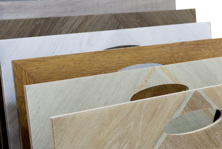Laminate background. Samples of laminate or parquet with a pattern and wood texture for flooring and interior design. Production of wooden floors..の写真素材