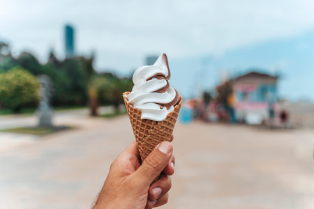 Ice Cream Cone on a Sunny Seaside Promenade