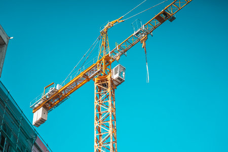 Crane on construction site background.の写真素材