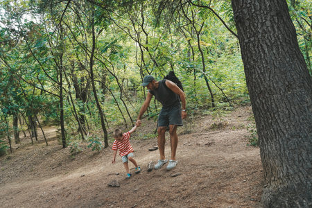 Father and Toddler Spending Time in Summer Forestの写真素材