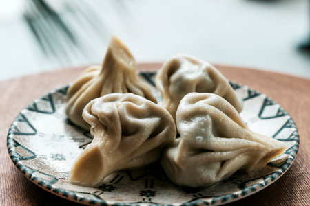 Georgian Khinkali. Traditional Dumplings on Plateの写真素材