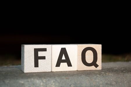 concept of FAQ word on wooden colorful cubesの写真素材