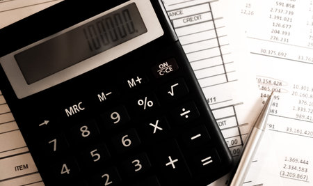 reduction of the financial balance and calculations on the calculator