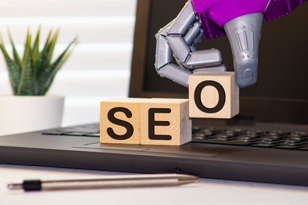 cubes with the acronym SEO for search engine optimization