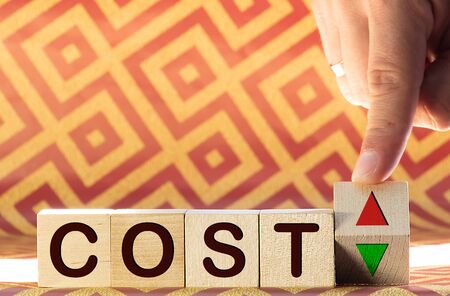 COSTS word made with building blocks isolated on whiteの写真素材