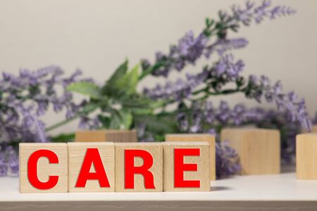 medicare word written on wood block. medicare text on table, concept.の写真素材