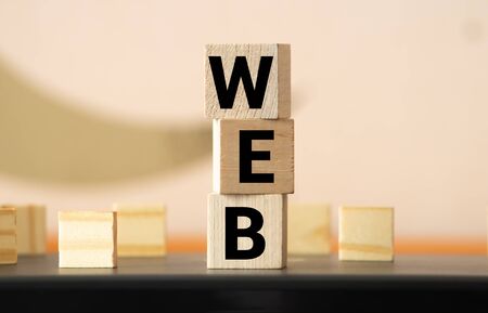 WEB word made with wooden blocks, internet conceptの写真素材