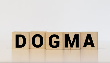 DOGMA word on white blocks concept, business concept