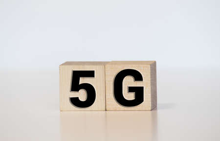 Four wooden blocks with 5G text of concept.の写真素材
