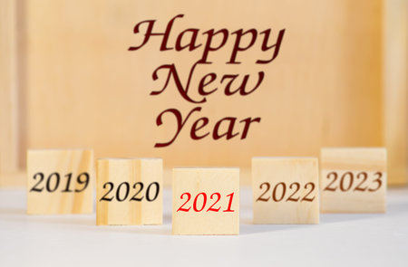 Wooden cube with numbers 2021 The beginning of the new year.