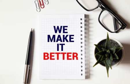 Handwriting text Make Things Better. Concept meaning Do something to Improve oneself Be the Change Act Striped paperboard notebook cardboard office study supplies chart paper.の写真素材