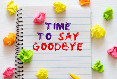 Time to Say Goodbye Text written on notebook page, red pencil on the right. Motivational Concept image.の写真素材