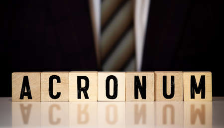 Wooden blocks with the word Acronym. Concept businessの写真素材