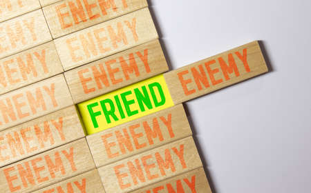 ENEMY word written on wood block,の写真素材