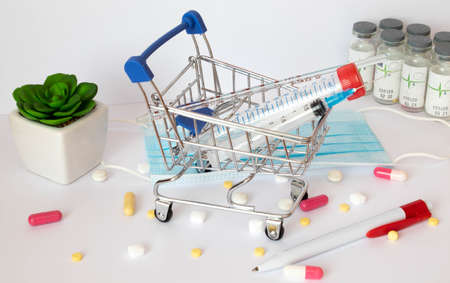 Shopping trolley with pills and medicine, conceptの写真素材