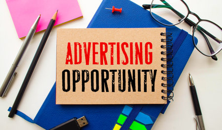 Business concept.Text SUCCESS COMPANY on notebook with torn paper, glasses, calculator and pen on wooden background.の写真素材