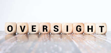 text Oversight on wooden blockの写真素材