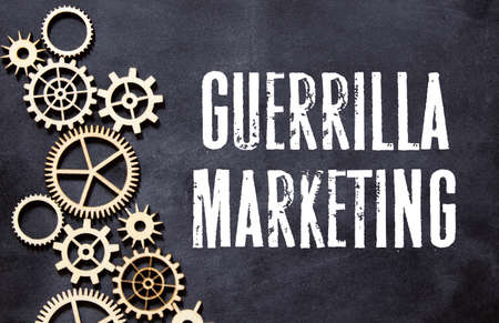 text Guerrilla Marketing on black background, conceptの写真素材