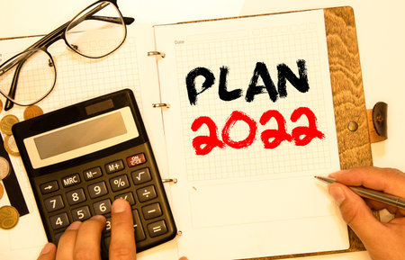 2022 goals. Yellow crumpled paper. Office supplies. Planning year concept. Copy space.