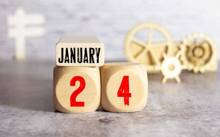 January 24th. Day 24 of january month, calendar on yellow background. Winter time. Empty space for text.の写真素材