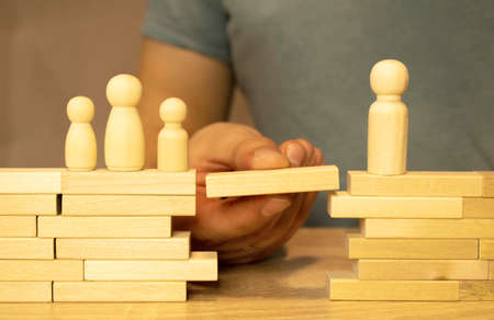 Divorce and divide concept. Models of family with child and house close-up.の写真素材