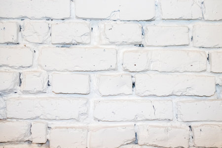 white brick wall sloppy texture brick and cement.の写真素材