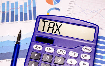 TAX TIME number on a calculator. business and tax concept. Pay tax in 2022 years. The new year 2022 tax conceptの写真素材