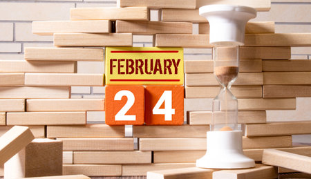 Cube shape calendar for February 24 on wooden surface with empty space for text,cube calendar for december on wood backgroundの写真素材