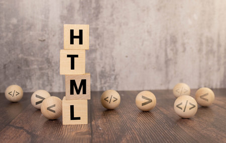 Word HTML on wooden blocks, white background. business and finance.