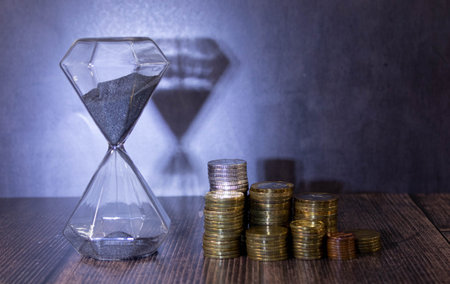 Close up of coins to stack of coins, Business Growth concept, There is money coins to stack of coins. financial risk.の写真素材
