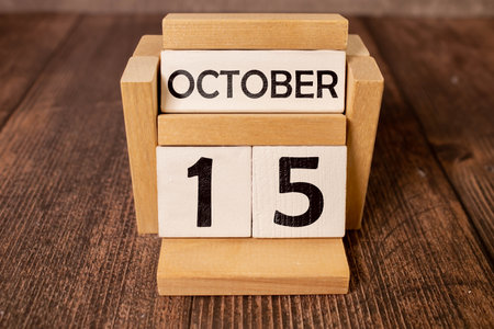 Wooden cubes with date on white background. 15th of October.の写真素材