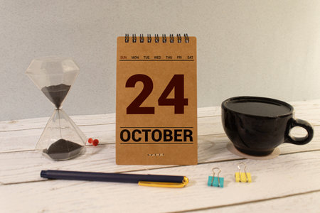 October 24 calendar date text on wooden blocks with copy space for ideas. Copy space and calendar concept.の写真素材