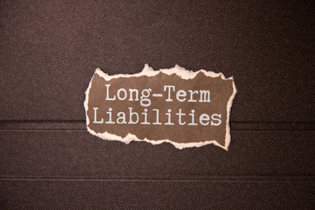 Working Capital. text on white paper, on a yellow backing and colored on a white background.の写真素材